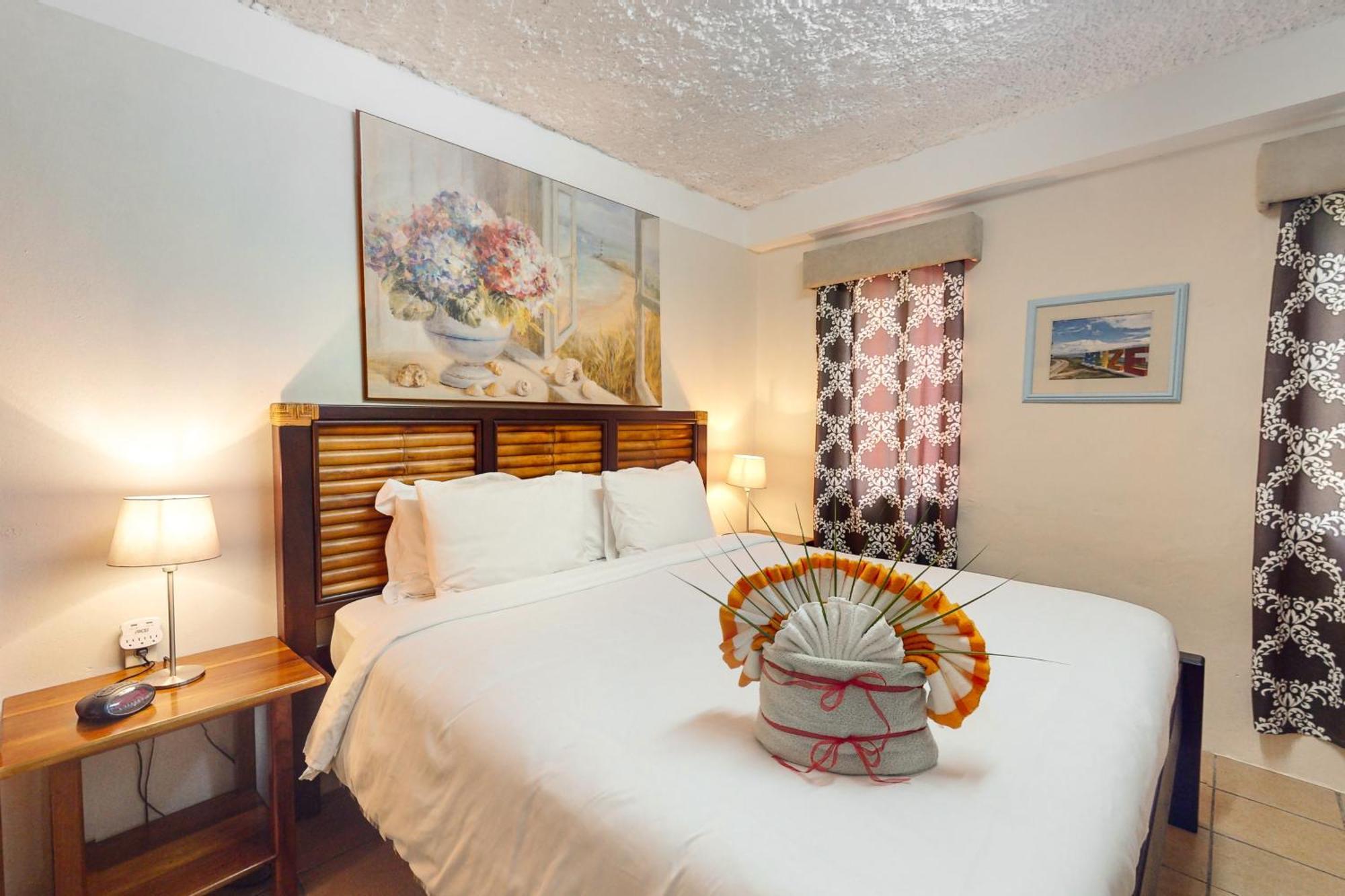 Hummingbird Home Suites San Pedro  Quarto foto