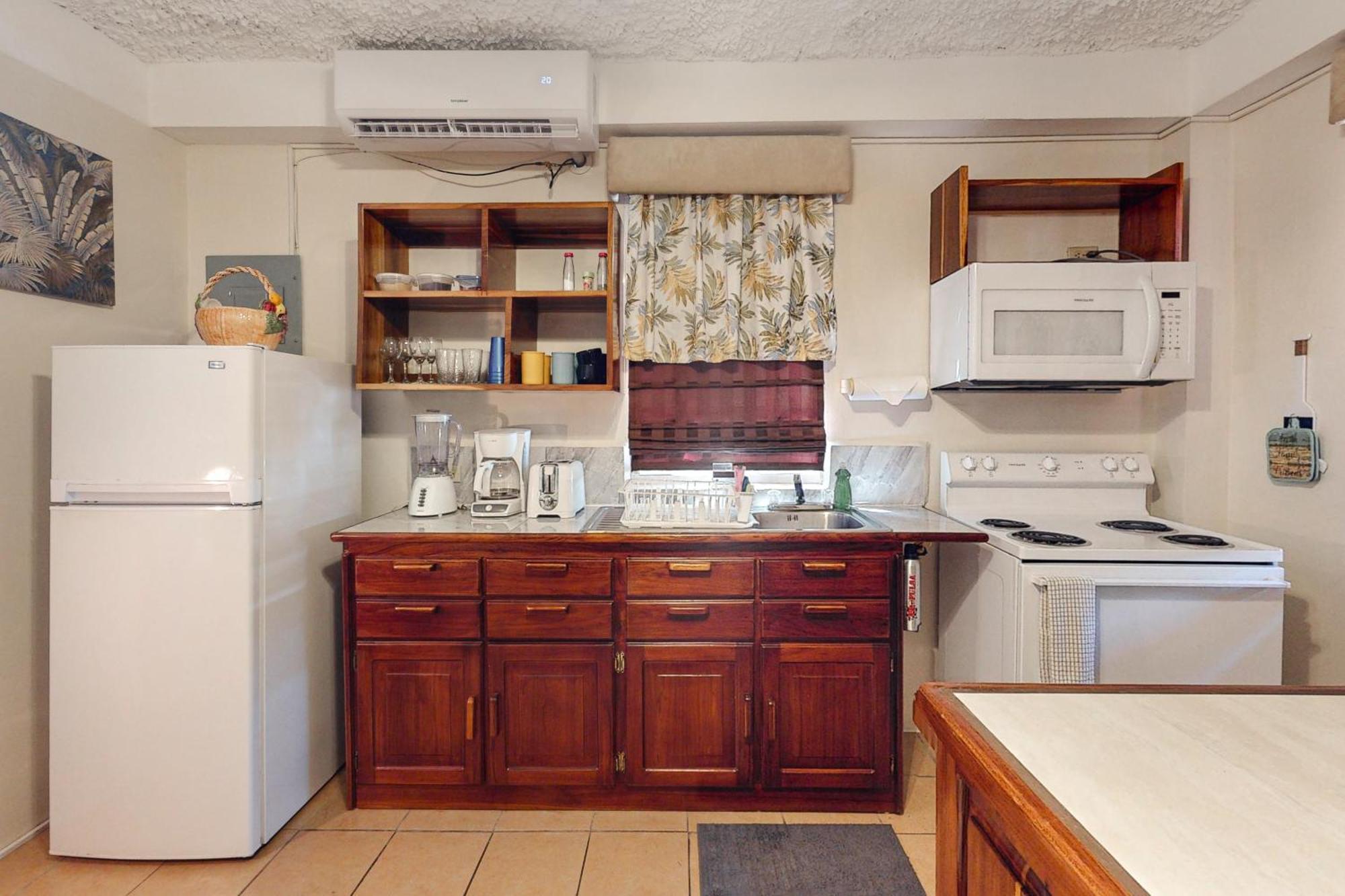 Hummingbird Home Suites San Pedro  Quarto foto