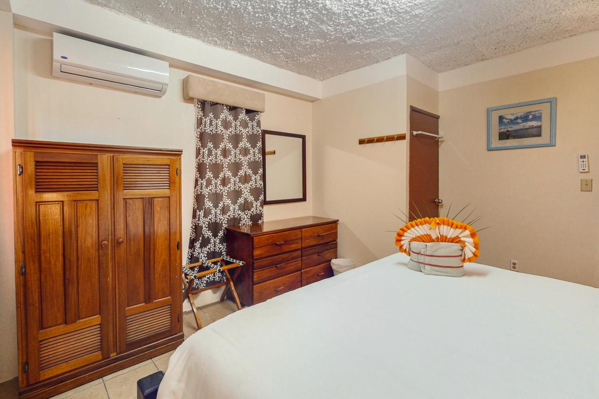 Hummingbird Home Suites San Pedro  Quarto foto