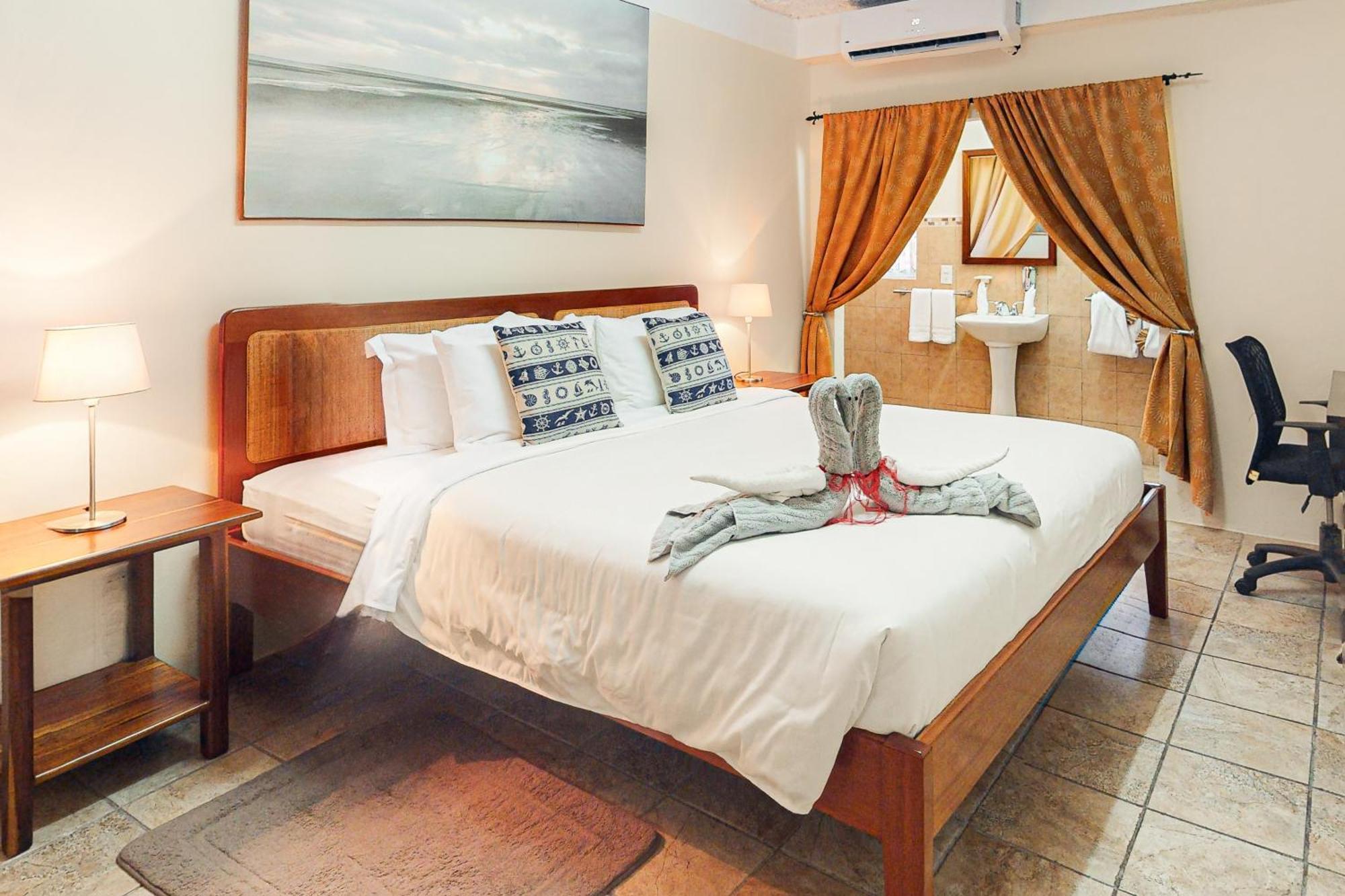 Hummingbird Home Suites San Pedro  Quarto foto