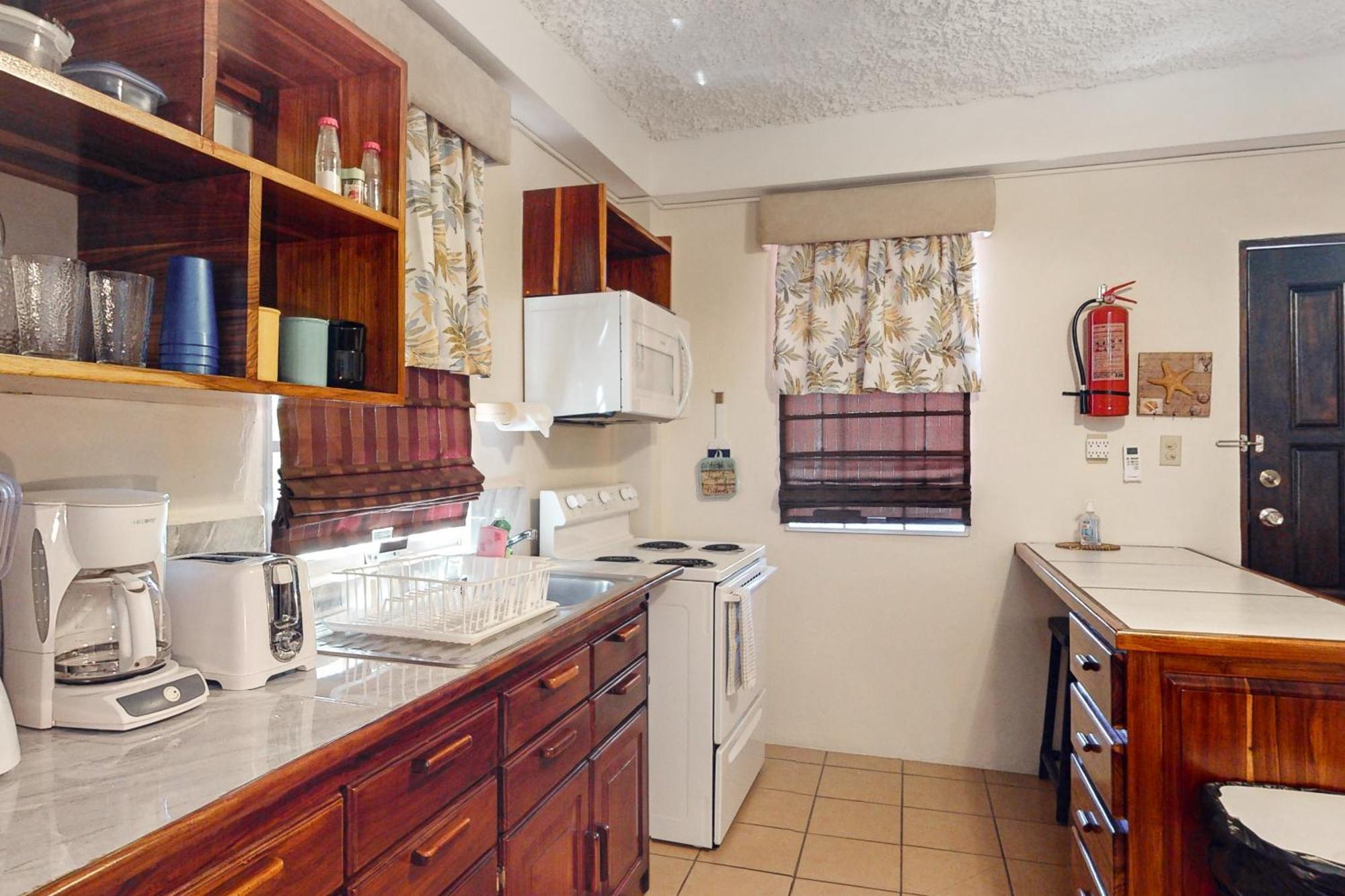 Hummingbird Home Suites San Pedro  Quarto foto