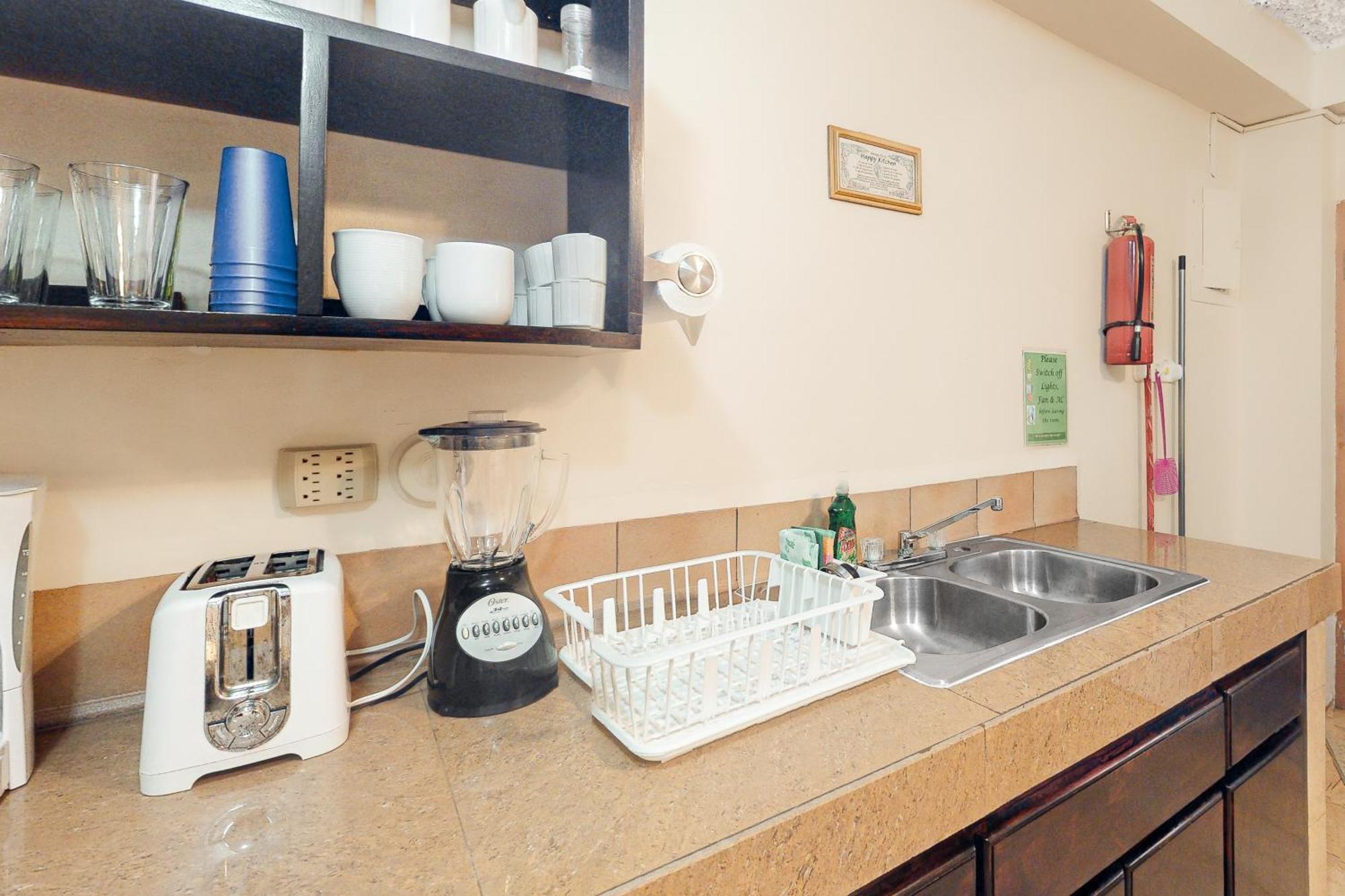Hummingbird Home Suites San Pedro  Quarto foto