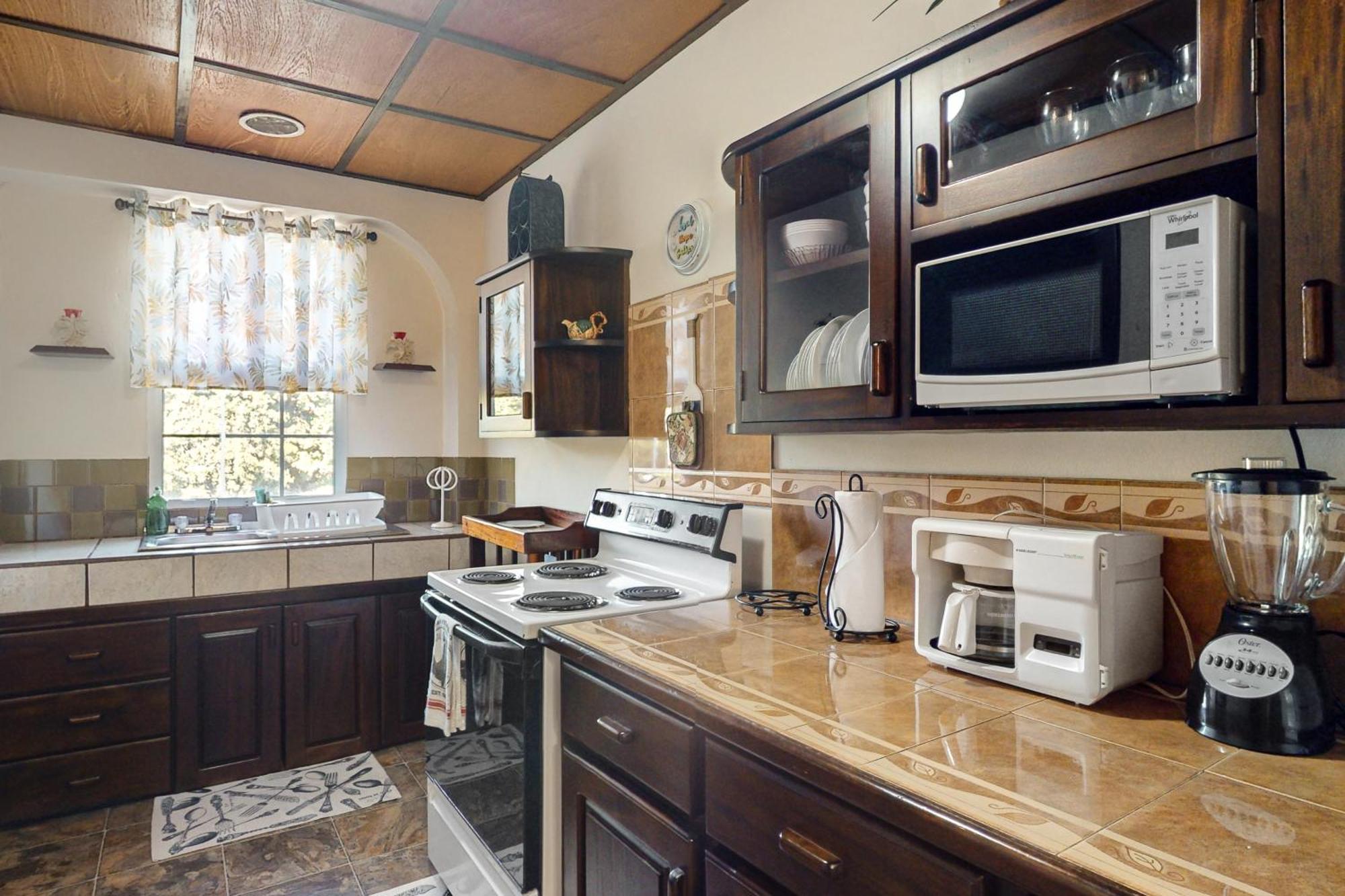 Hummingbird Home Suites San Pedro  Quarto foto