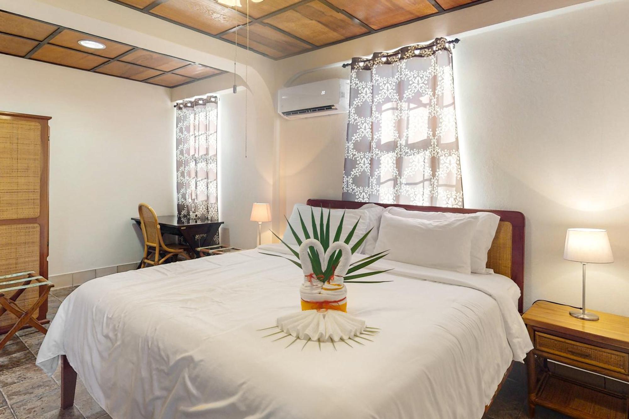 Hummingbird Home Suites San Pedro  Quarto foto