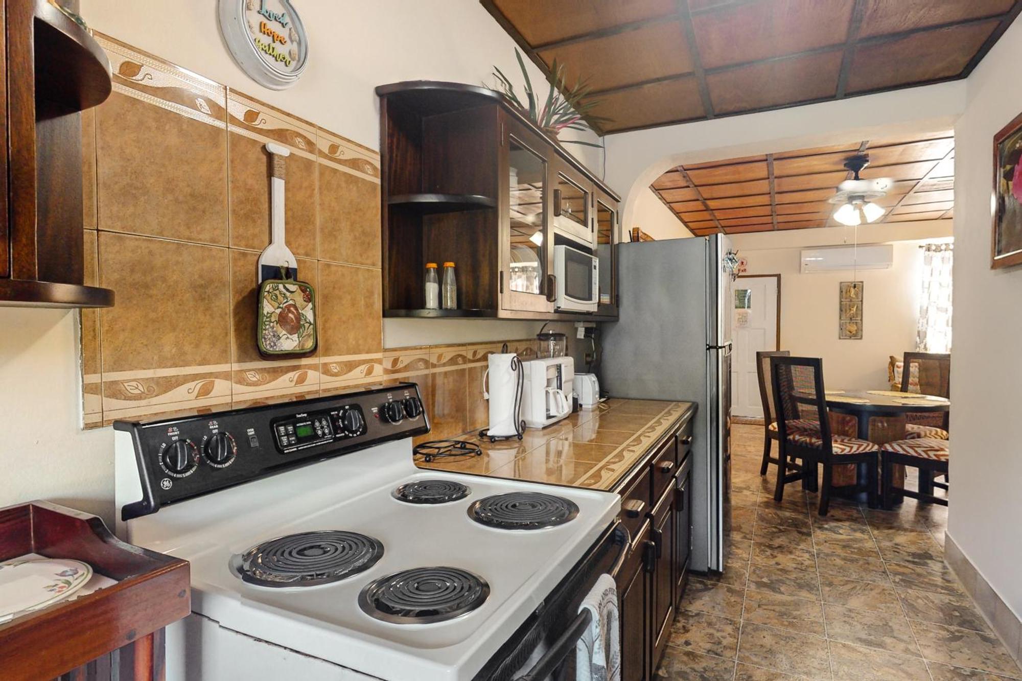 Hummingbird Home Suites San Pedro  Quarto foto